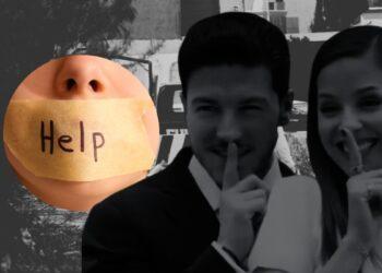 Mouth taped shut with a sticky note reading ‘Help,’ with two people in the blurred background making shushing gestures.